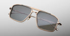 Jacques Marie Mage Earl gold rectangular sunglasses with dark lenses, front view.