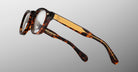 Jacques Marie Mage Eiko eyeglasses, gold-detailed arms, side angle view.