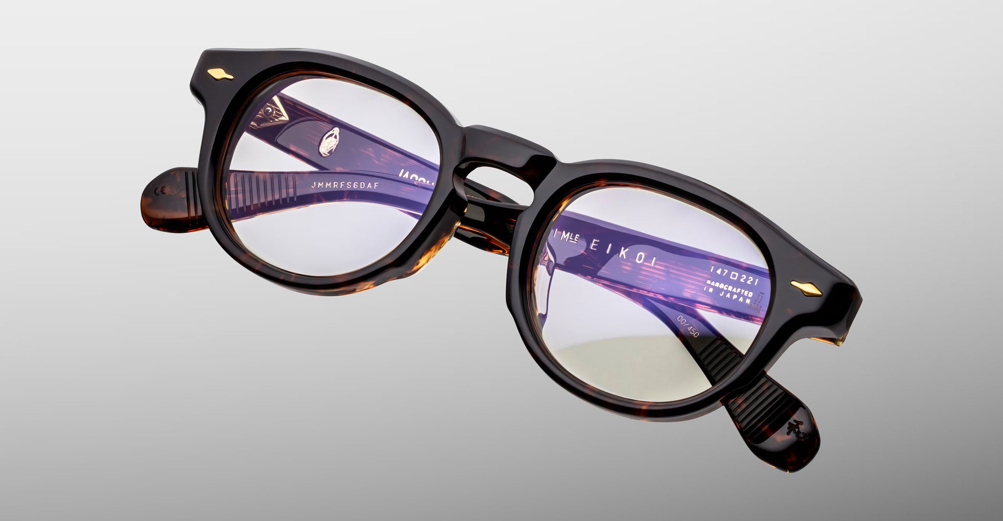 Jacques Marie Mage Eiko tortoiseshell round eyeglasses with visible inner branding, front-angle view.