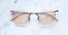 Jacques Marie Mage El Dorago rimless sunglasses in Rose Gold colorway