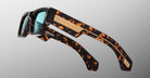 Jacques Marie Mage Engel sunglasses with thick tortoiseshell frames and wooden inlays, front view.