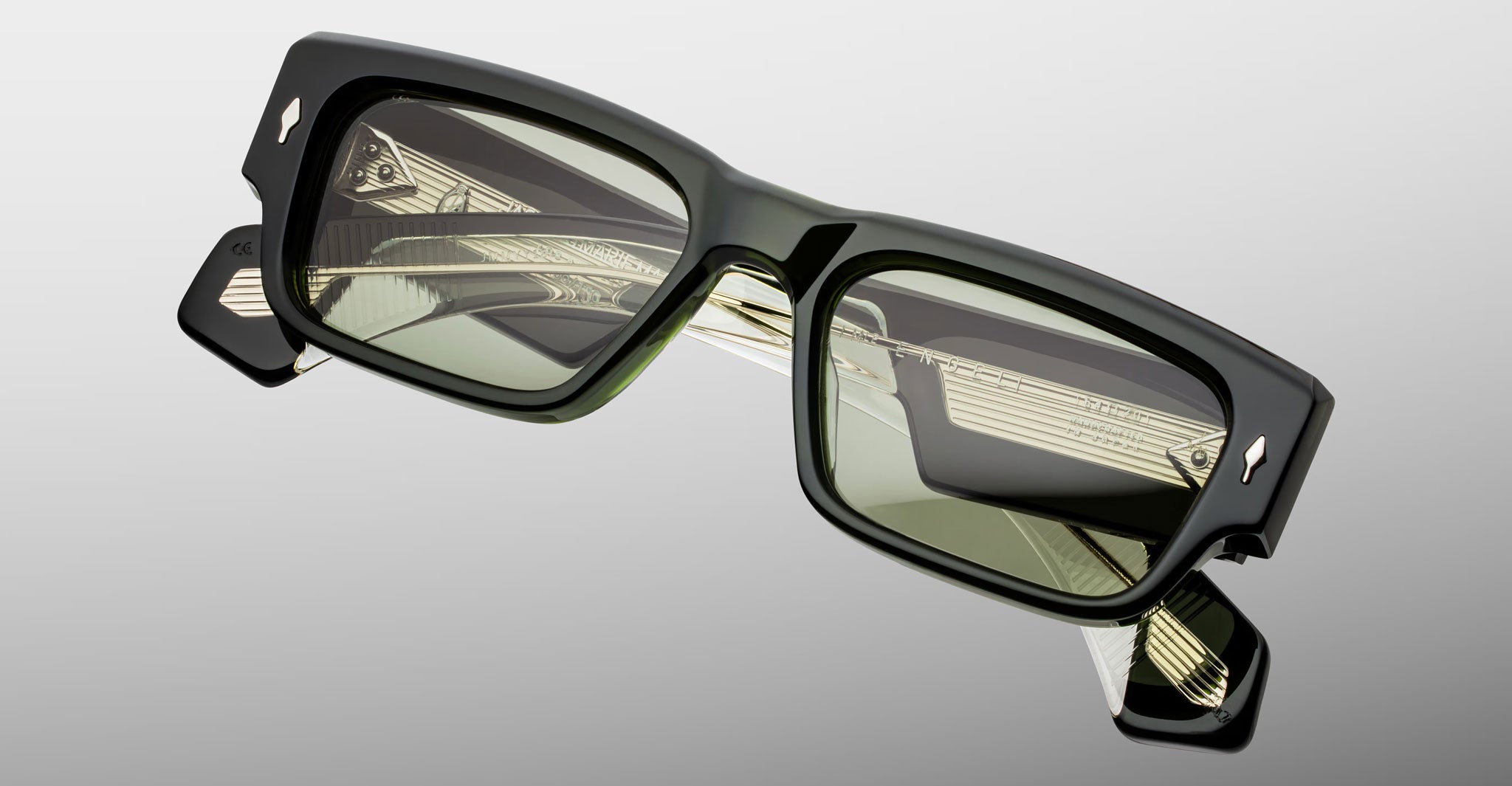 Jacques Marie Mage Engel rectangular black sunglasses with green lenses, front view.
