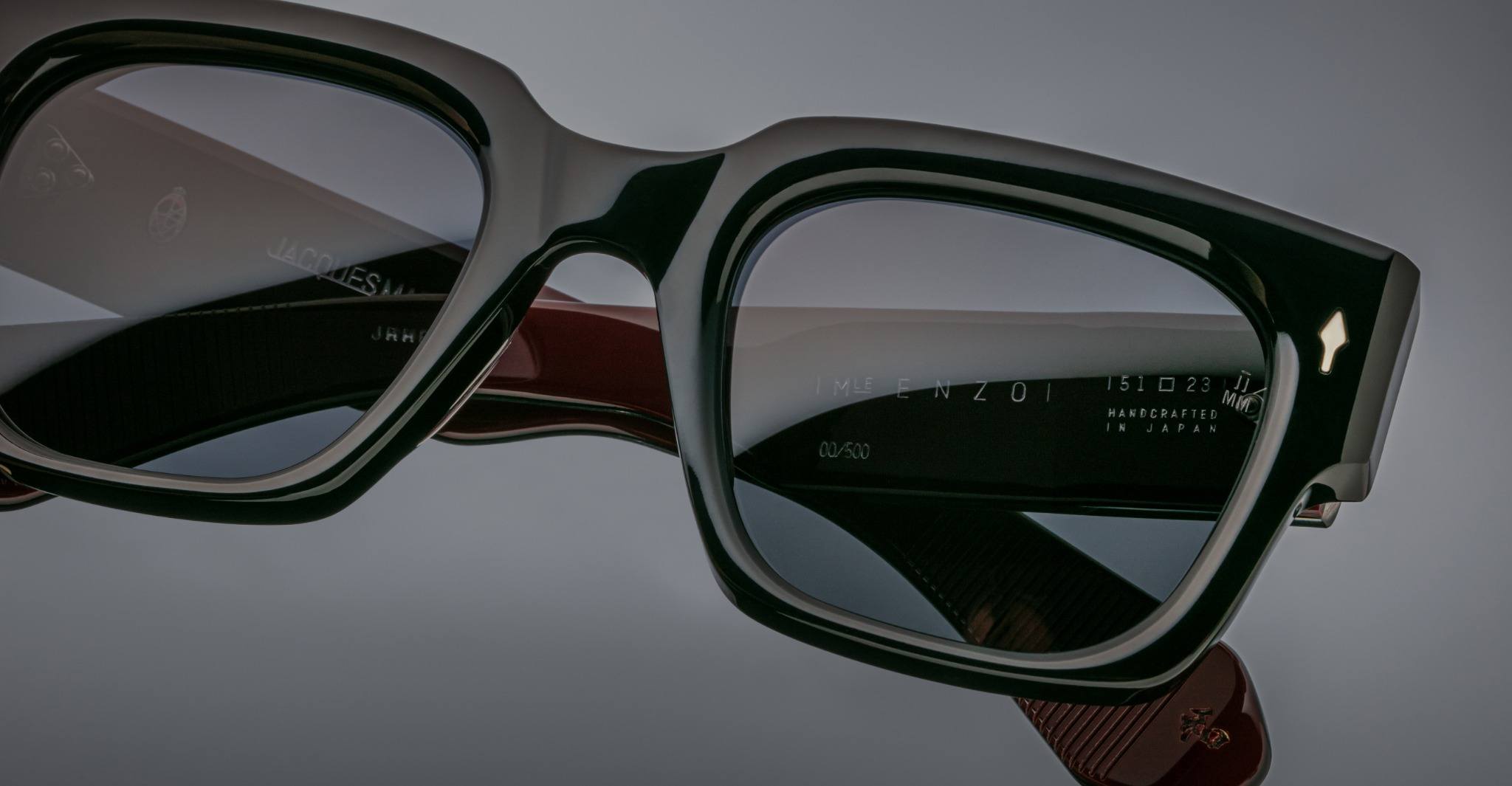 Jacques Marie Mage Enzo black rectangular eyeglasses, close-up view highlighting frame details and inside arm branding.