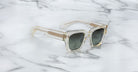 Jacques Marie Mage Enzo square-frame sunglasses with UV-protection lenses, top-down view.