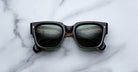 Jacques Marie Mage Enzo black square sunglasses with dark lenses, front view.