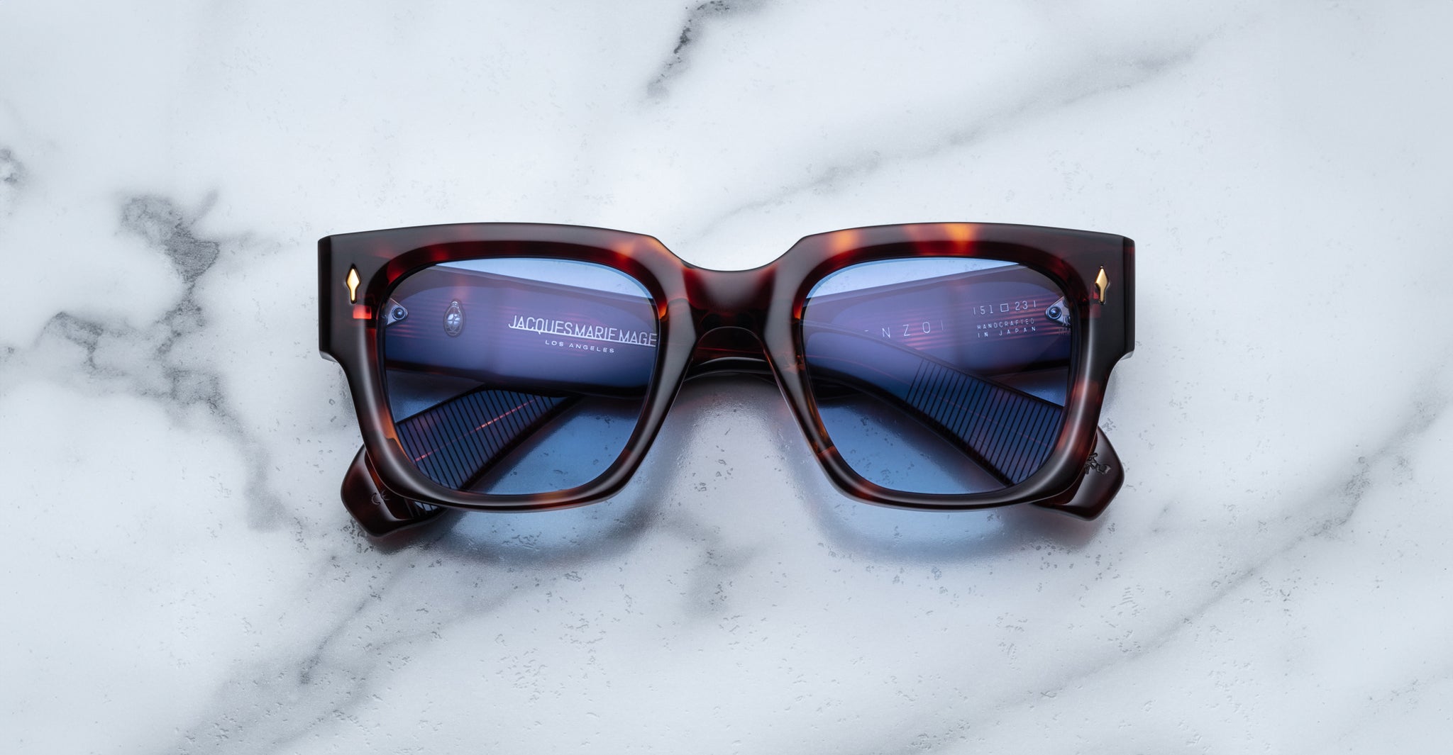 Jacques Marie Mage Enzo rectangular tortoiseshell sunglasses with blue lenses, front view.