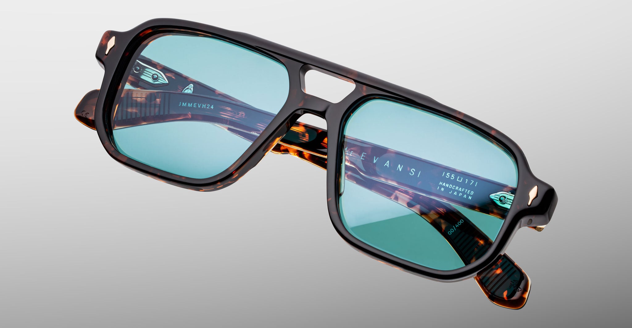 Jacques Marie Mage Evans tortoiseshell sunglasses with blue lenses, front view showing classic rectangular frame.