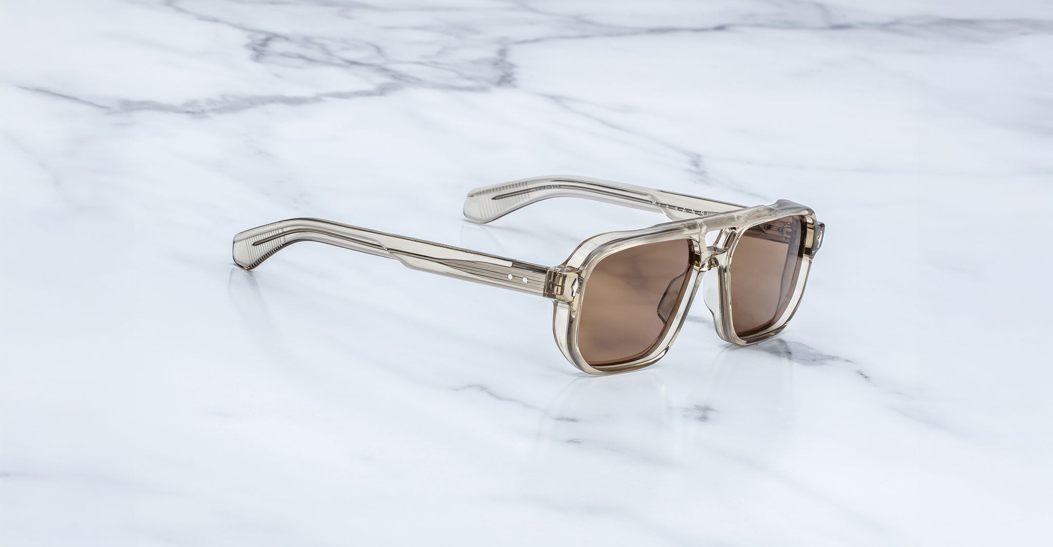 Jacques Marie Mage Evans beige sunglasses with brown lenses, top view showing full frame and lenses.