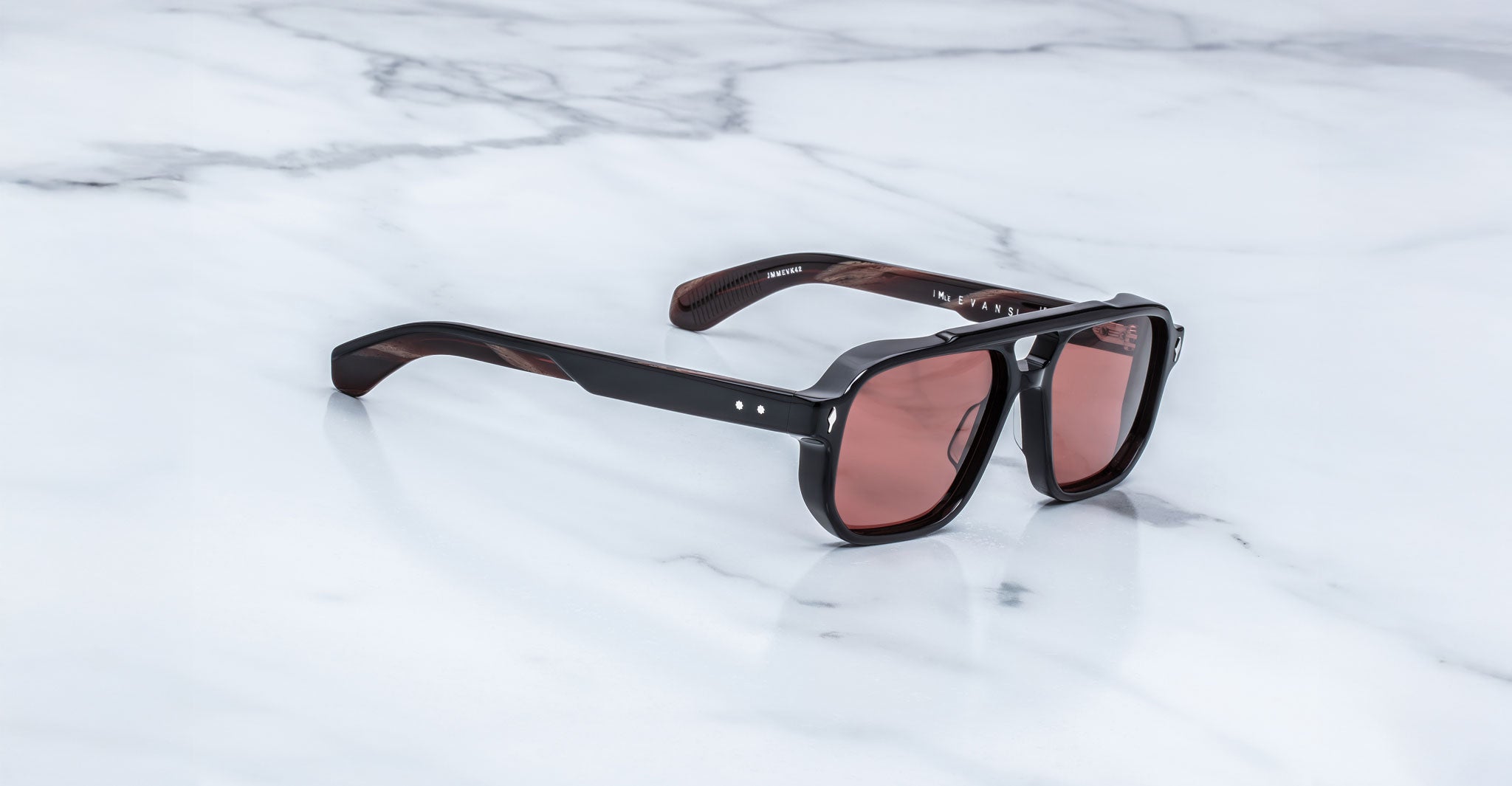 Jacques Marie Mage Evans sunglasses with brown tinted lenses, shown from above.