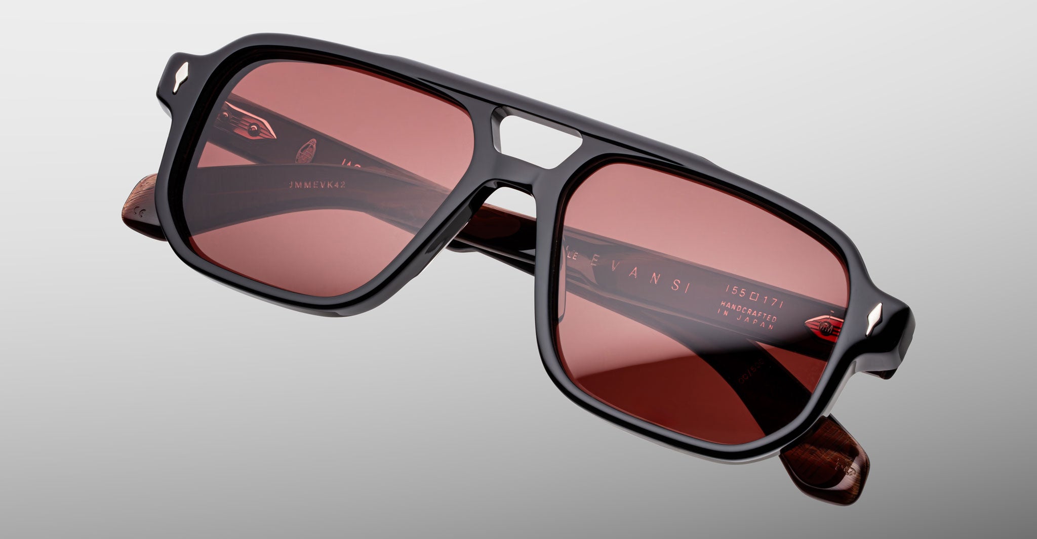 Jacques Marie Mage Evans sunglasses, black frames, red lenses, front view.