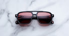 Jacques Marie Mage Evans sunglasses with red lenses, front view, showing round frames and wide temples.