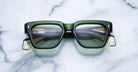 Jacques Marie Mage Fellini olive green square polarized sunglasses with thick frames, front view.