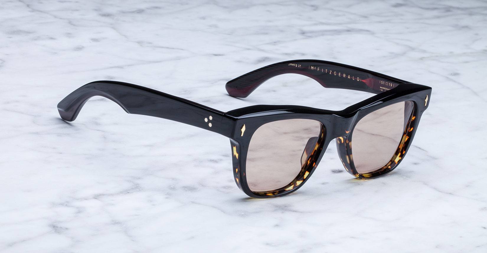 angled view of the Jacques Marie Mage Fitzgerald style sunglasses in colorway Duo