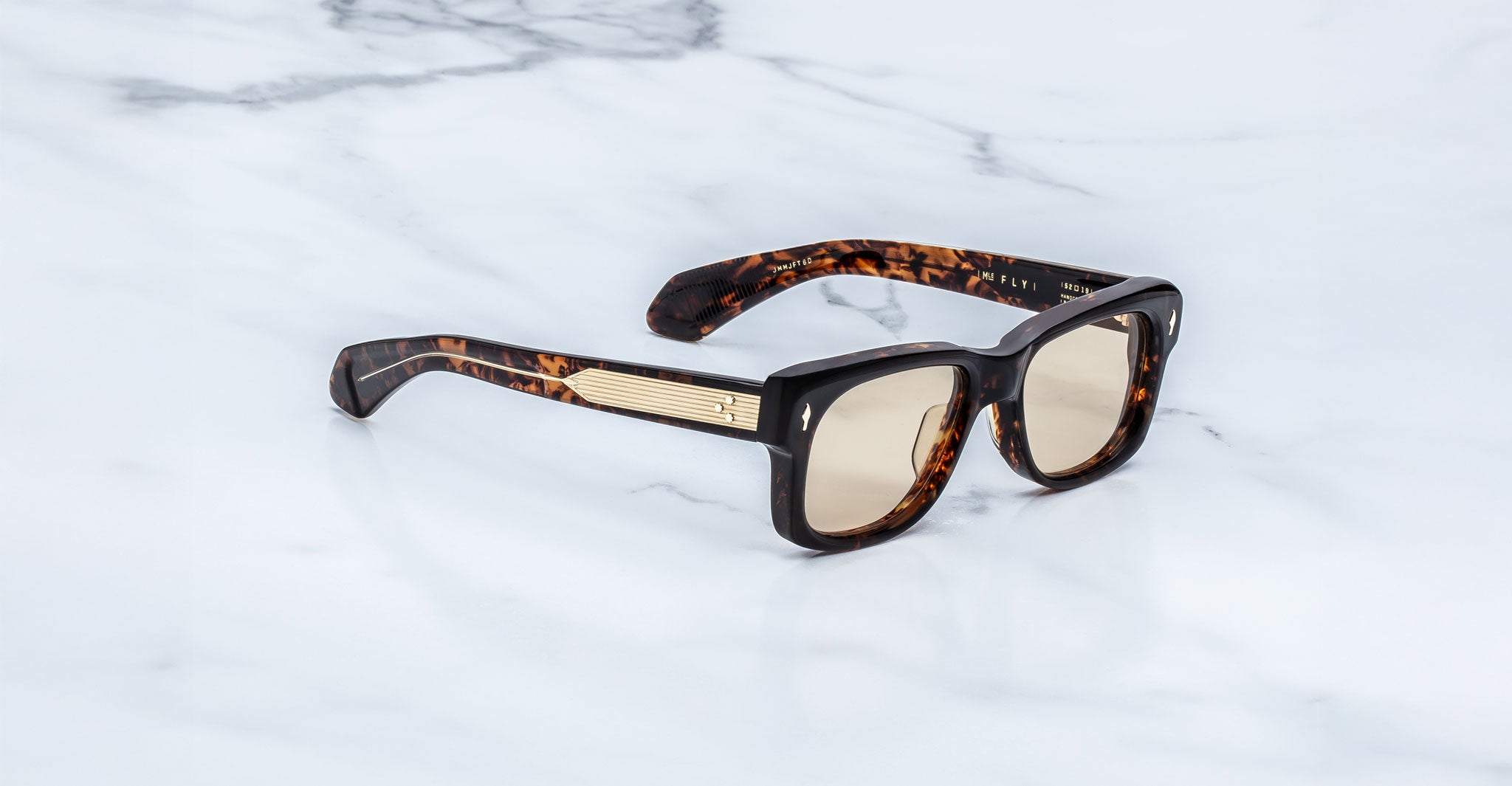 Jacques Marie Mage Fly sunglasses with gold-detailed arms, side view.