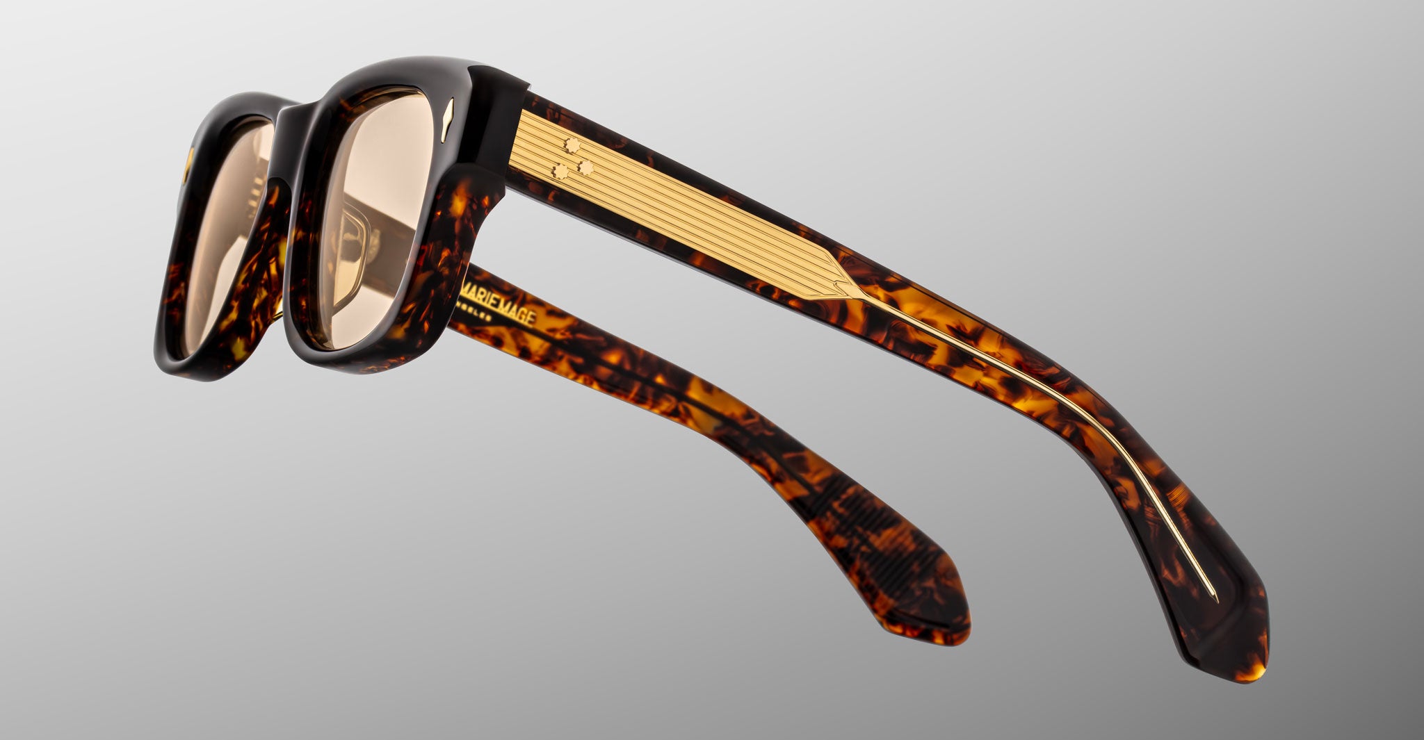 Jacques Marie Mage Fly rectangular tortoiseshell eyeglasses with gold arms, front view.