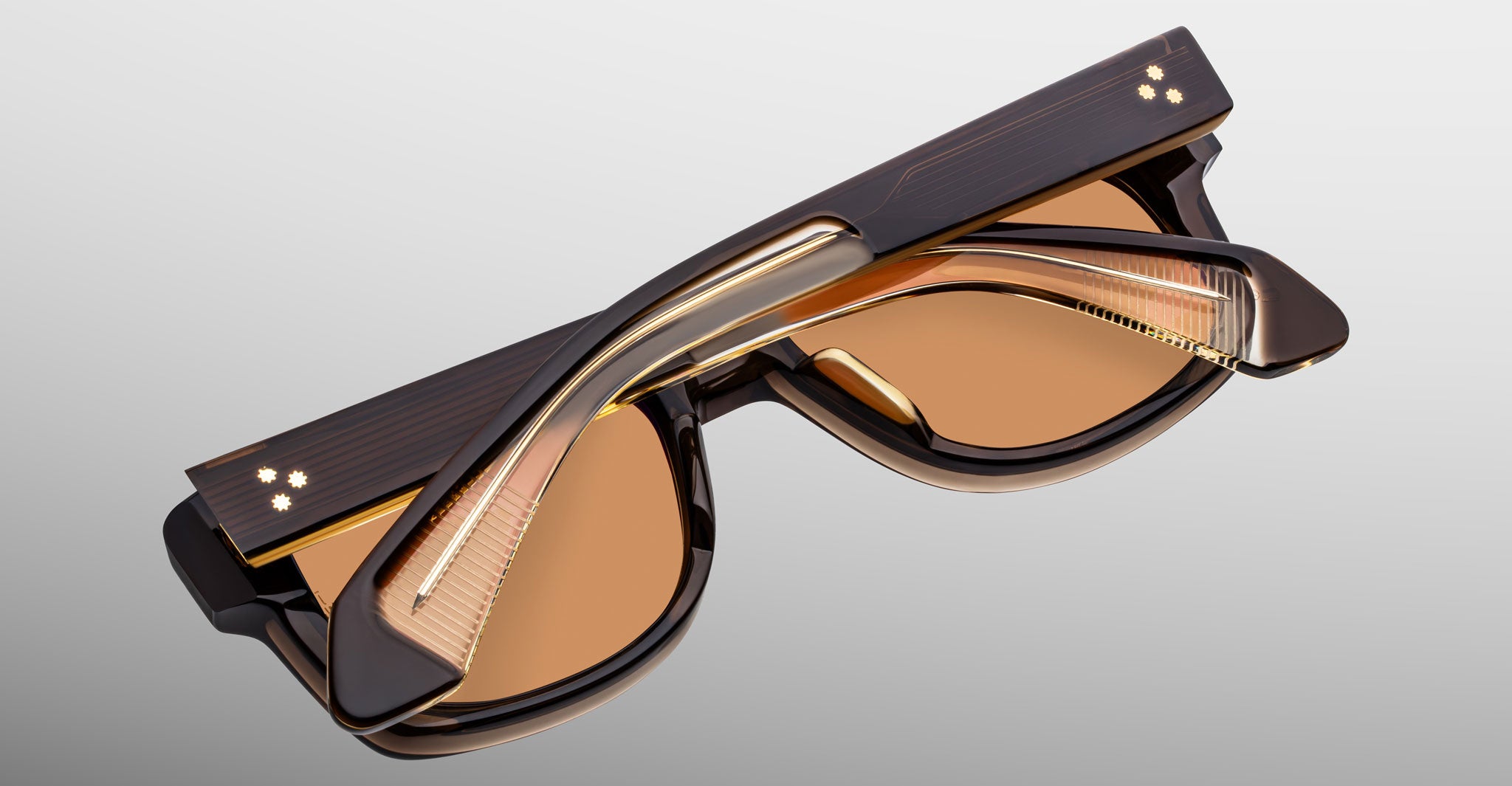 Jacques Marie Mage Fly sunglasses, folded, viewed from above; designer eyewear featuring signature frame details.