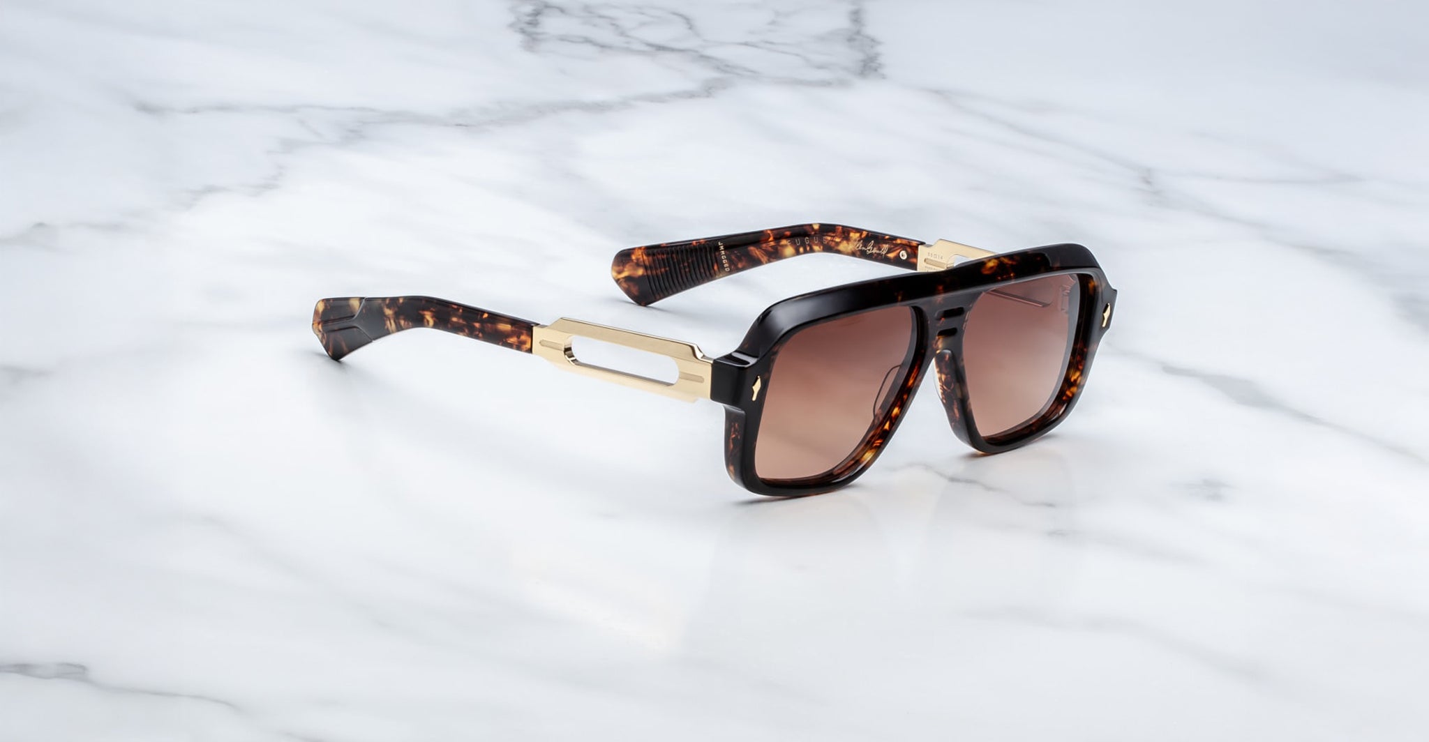Jacques Marie Mage Fugue sunglasses with gold accents and UV lenses, top view, designer eyewear by Jacques Marie Mage.