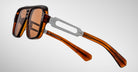 Jacques Marie Mage Fugue brown square sunglasses with metal hinges, amber acetate arms, front view.