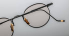 Close-up of Jacques Marie Mage Full Metal Jacket eyeglasses, back view of the engraved temples.
