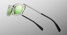 Jacques Marie Mage Gaspard sunglasses with clear frames, green lenses, and black arms shown from the front view.