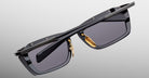 Jacques Marie Mage Gaspard black rectangular sunglasses with gold nose pads, front view.