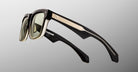 Jacques Marie Mage Hyannis in Black Fade black sunglasses with gold temple accents, front view. Bold frame design.