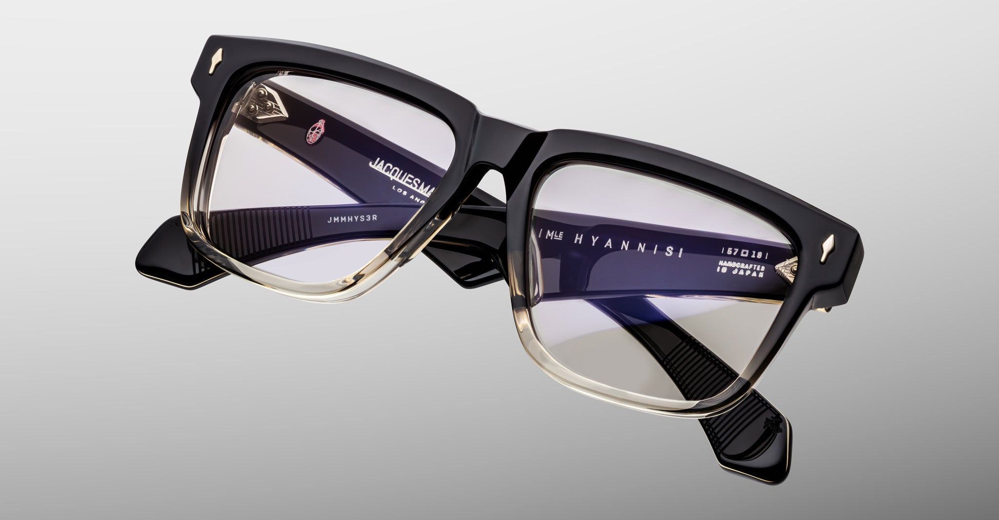 Jacques Marie Mage Hyannis in Black Fade black and taupe rectangular eyeglasses with clear lenses, front view, featuring a modern design.