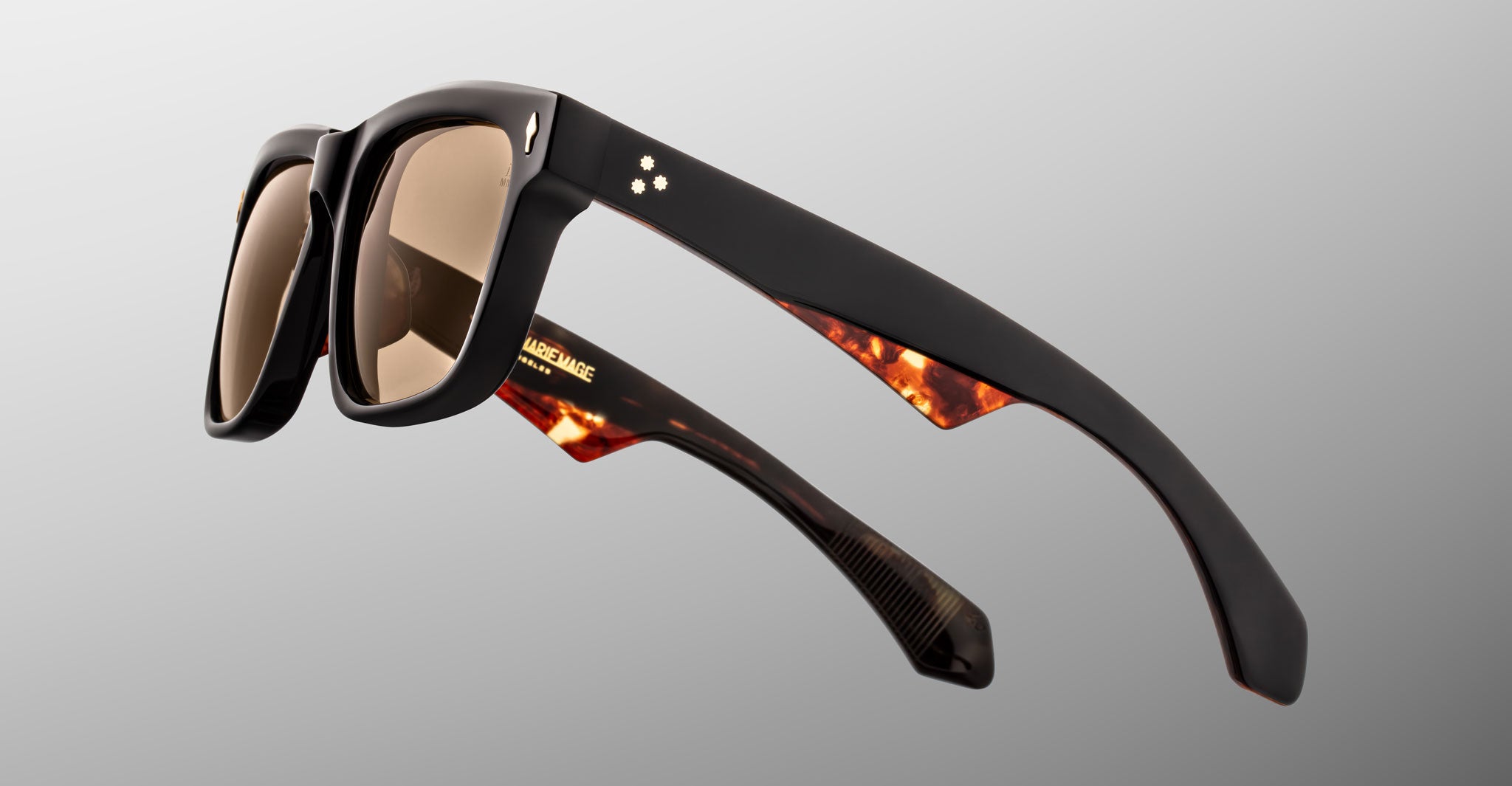 Jacques Marie Mage Hyannis in Noir 15 sunglasses, black frames with brown tortoiseshell arms, classic style, profile view.