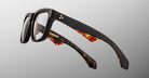 Jacques Marie Mage Hyannis in Noir 15 eyeglasses, close-up view, black front frame with tortoiseshell-patterned arms, modern rectangular design.
