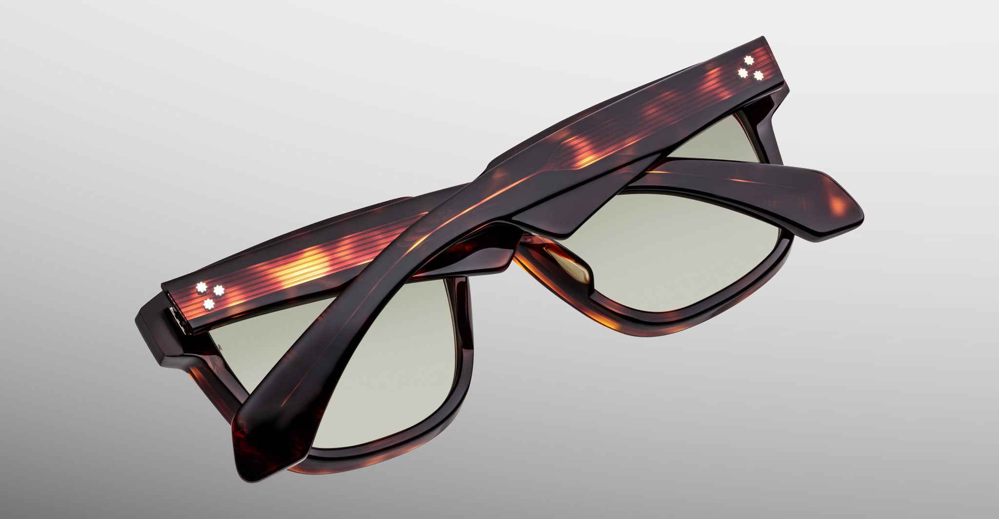 Jacques Marie Mage Hyannis in Tenace tortoiseshell sunglasses, green lenses, folded, viewed at a back angle.