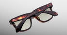 Jacques Marie Mage Hyannis in Tenace tortoiseshell sunglasses, green lenses, folded, viewed at a back angle.