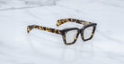 Jacques Marie Mage Ichikawa rectangular tortoiseshell eyeglasses with thick frames, front view.