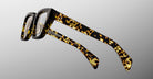 Jacques Marie Mage Ichikawa rectangular eyeglasses, tortoiseshell thick frames, silver hinges, shown from the front.