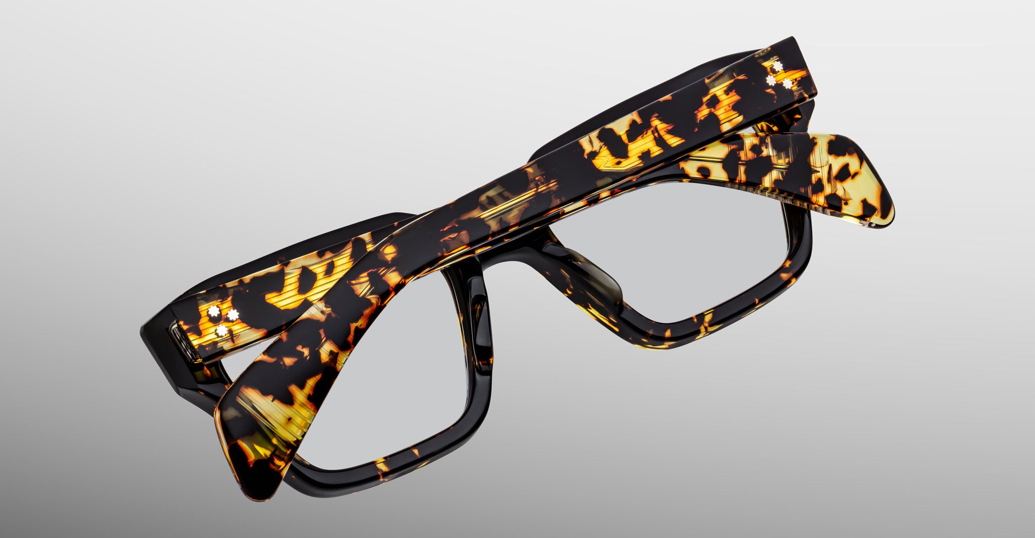 Jacques Marie Mage Ichikawa tortoiseshell eyeglasses, folded, viewed from above.