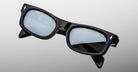 Jacques Marie Mage Initials in Black Mirror black rectangular sunglasses with thick frames and tinted lenses, front view.