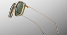 Jacques Marie Mage Jagger gold sunglasses with green lenses and thin arms, front angled view.