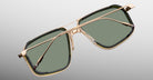Jacques Marie Mage Jagger sunglasses with gold frames and green lenses, shown from the front.
