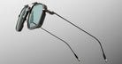 Jacques Marie Mage Jagger black sunglasses with green rectangular lenses and slim temples, front view.