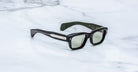 Jacques Marie Mage Jeff in Cobra angle view showing silver inserts against the black temples