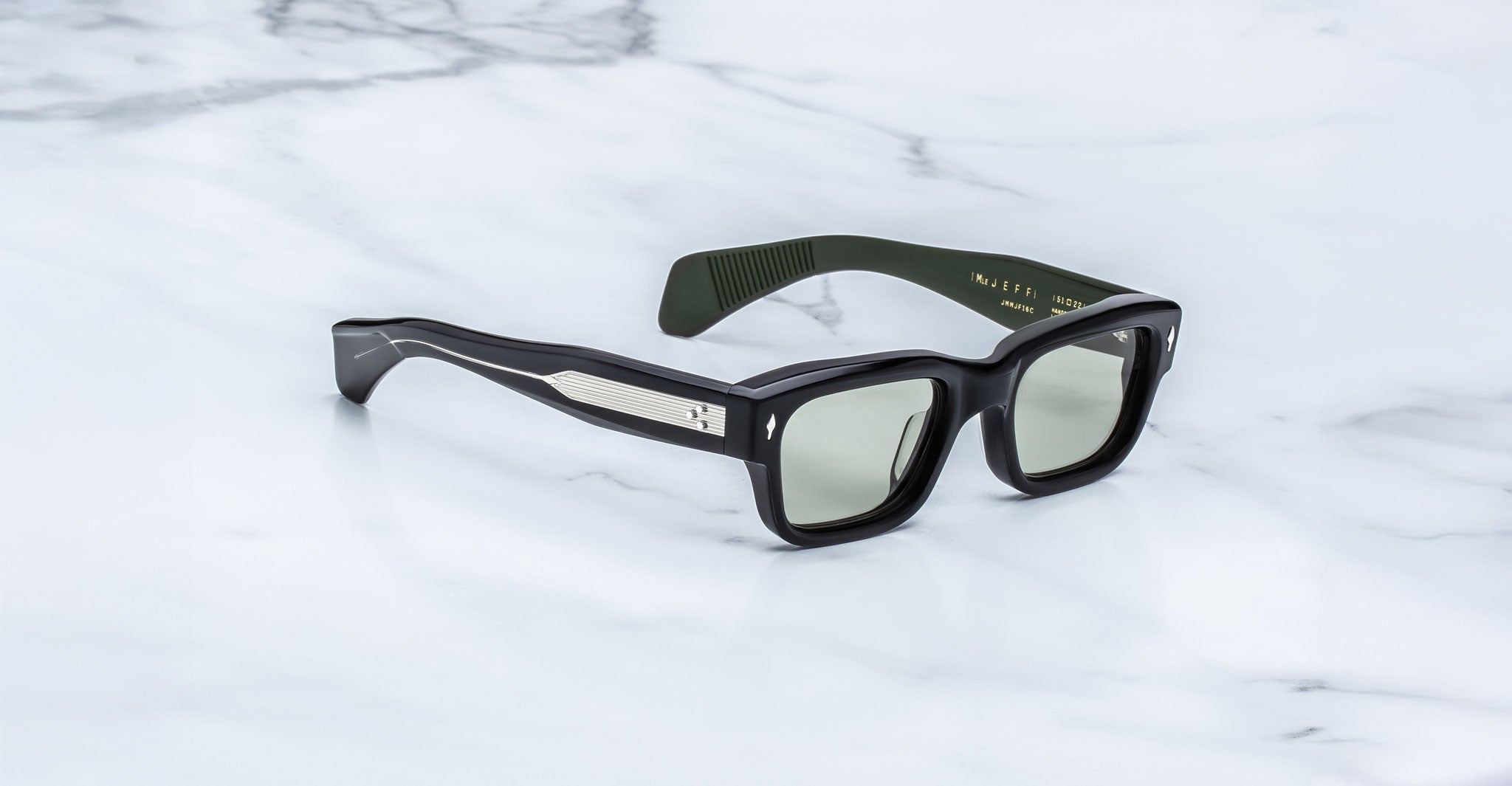 Jacques Marie Mage Jeff in Cobra angle view showing silver inserts against the black temples