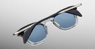 Jacques Marie Mage Kennedy blue-light eyeglasses, black and silver frame, top view.