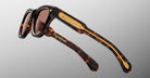 Jacques Marie Mage Kinshasa sunglasses, tortoiseshell frame with gold temples, side view.