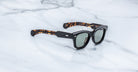 Jacques Marie Mage Kinshasa sunglasses with UV lenses and tortoiseshell arms, shown from above.