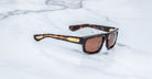 Jacques Marie Mage Louisville sunglasses, tortoiseshell frame, polarized brown lenses, gold accents, front view.