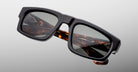 Jacques Marie Mage Louisville sunglasses, rectangular black frames, dark lenses, tortoiseshell arms, front view.