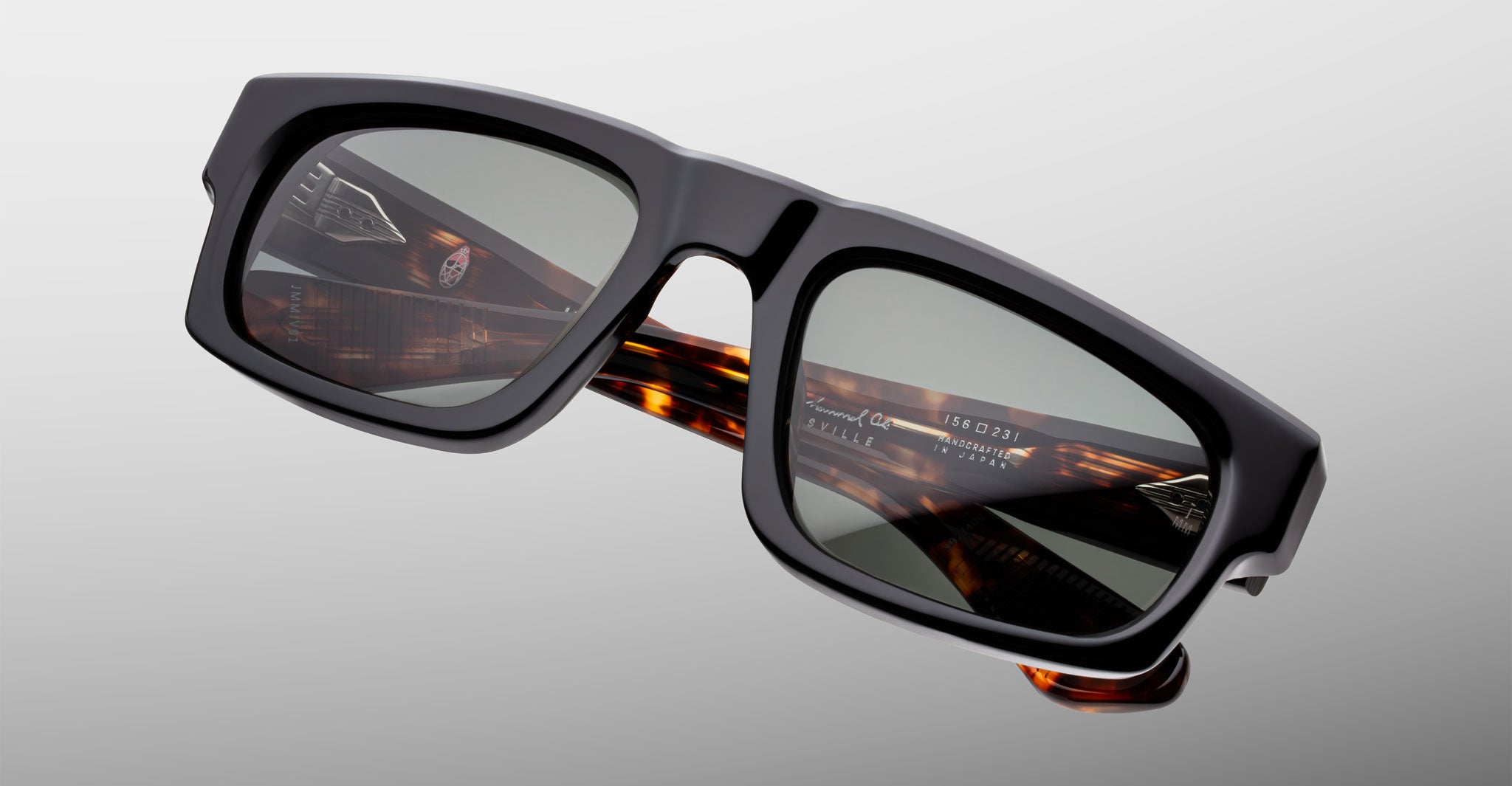 Jacques Marie Mage Louisville sunglasses, rectangular black frames, dark lenses, tortoiseshell arms, front view.