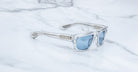 Jacques Marie Mage Louisville sunglasses with blue lenses, front view, showing thick frames and distinct lens color.
