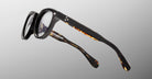 Jacques Marie Mage Matsu round eyeglasses, black and tortoiseshell frame, side view.