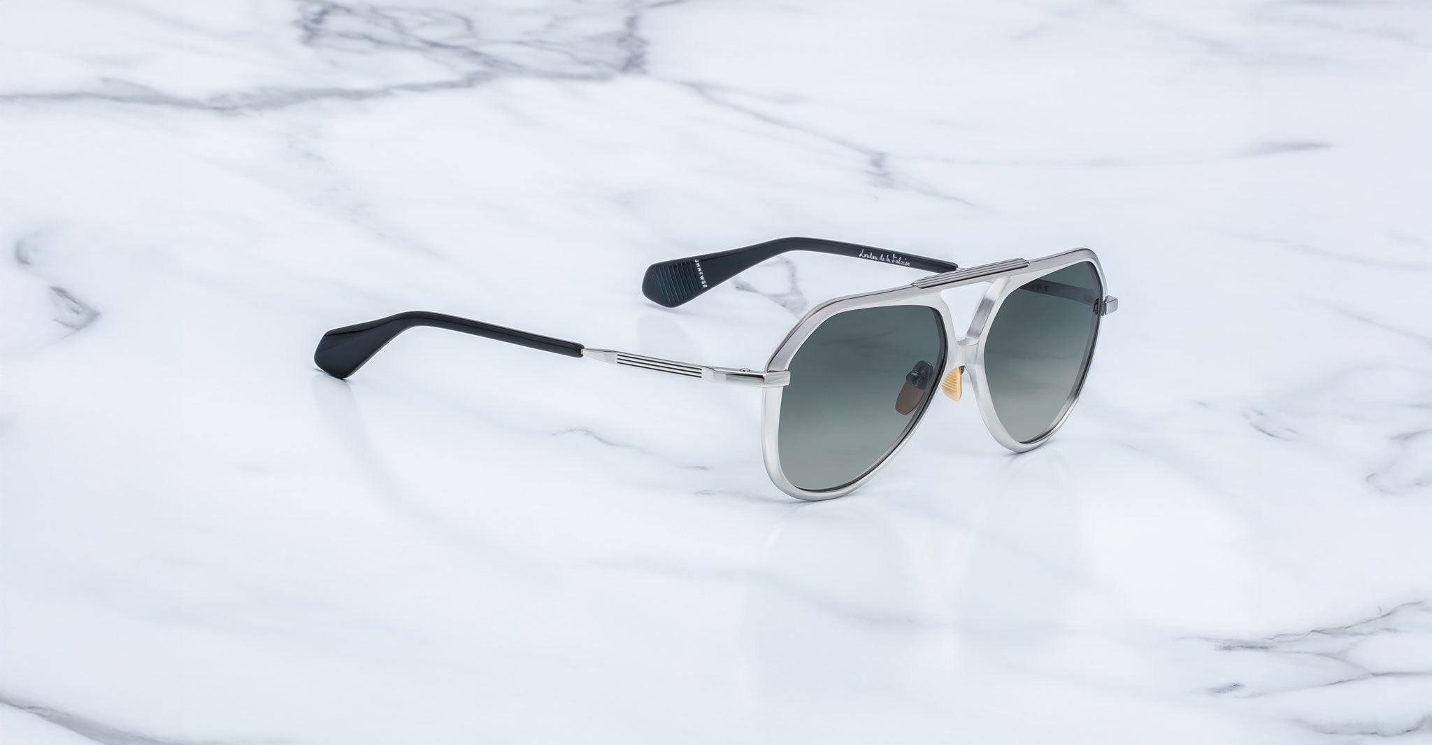 Jacques Marie Mage Maxime aviator sunglasses with silver frame, dark polarized lenses, and black arms, front view.