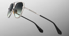 Jacques Marie Mage Maxime aviator sunglasses feature a silver frame, black gradient lenses, and black temple tips, front view.